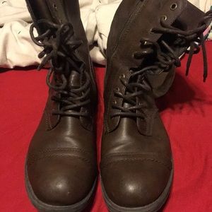 Brown and black combat boots